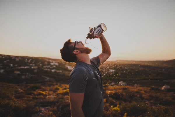 Man drinking call-a-cooler water