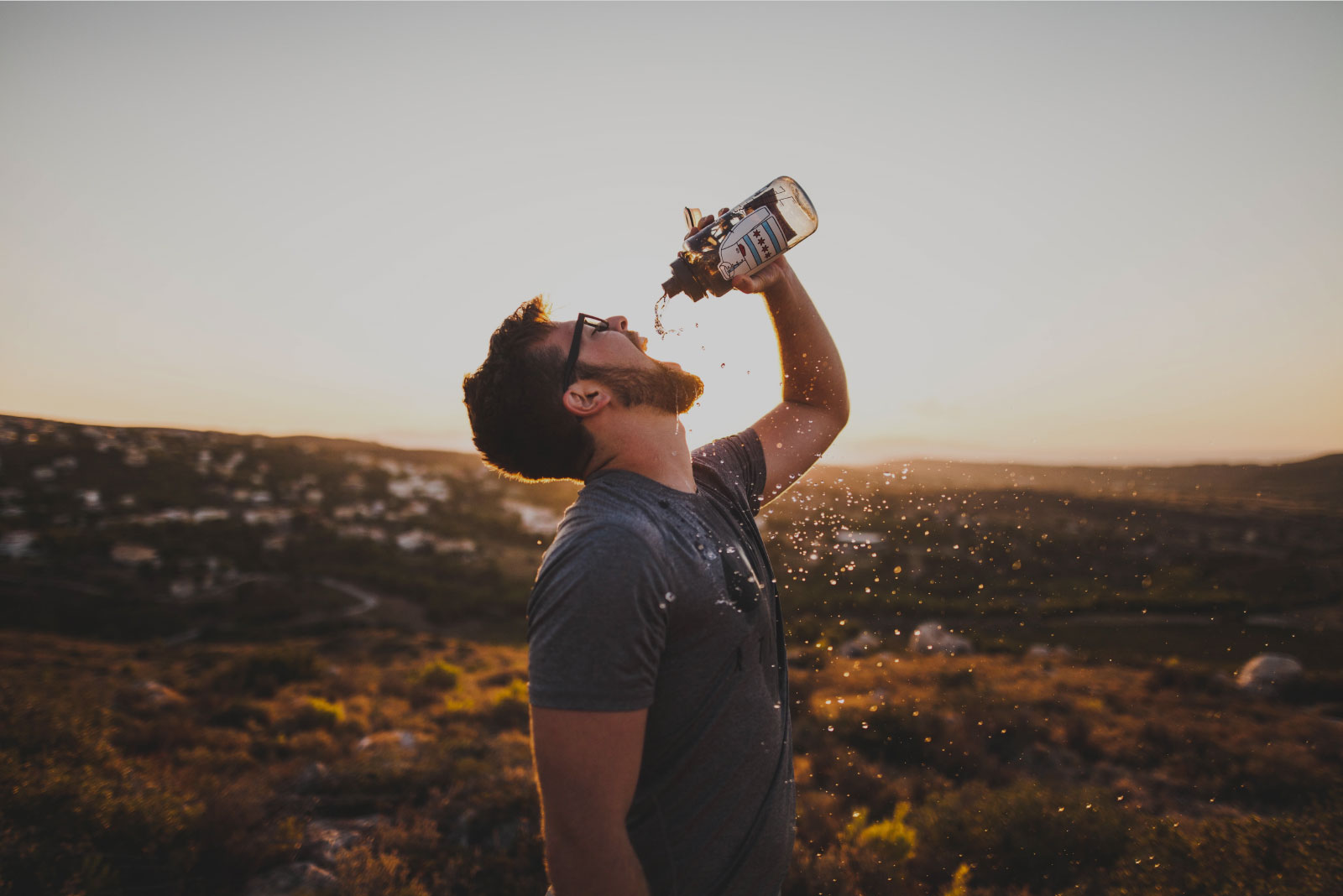 Man drinking call-a-cooler water
